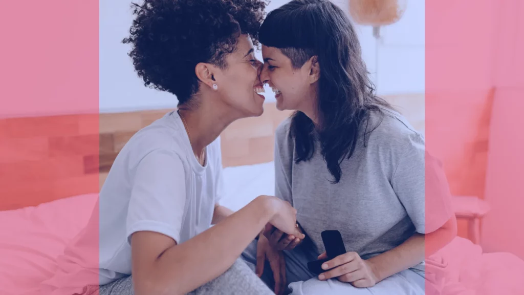 A young queer couple enjoy a romantic moment after getting engaged